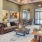 a large room with a chandelier and a couch